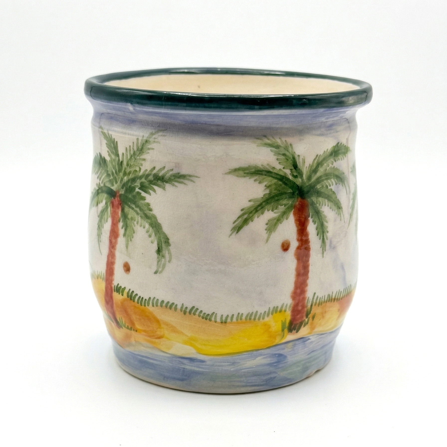 Handmade planter with painted palm trees and beach scene